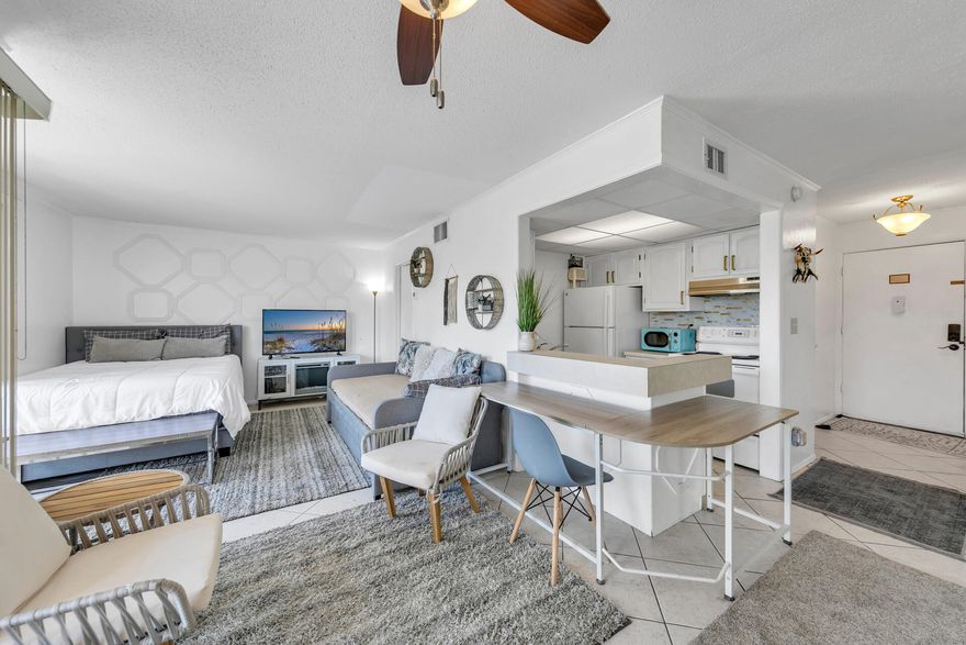 NOW ACCEPTING BITCOIN! Welcome to unit 1031 in Sandpiper Cove, a charming 1-bedroom, 1-bathroom condo located on the serene first floor. Recently renovated, this condo boasts views of the putting greens and the main canal.Discover the abundant amenities that Sandpiper Cove has in store for you: five inviting swimming pools, including two heated pools, three relaxing hot tubs, six well-maintained tennis courts, and a Par-3 9-hole chip and putt golf course. Additional perks include canal dockage, a convenient boat launch, access to a private owners marina, and the esteemed Louisiana Lagniappe Restaurant.