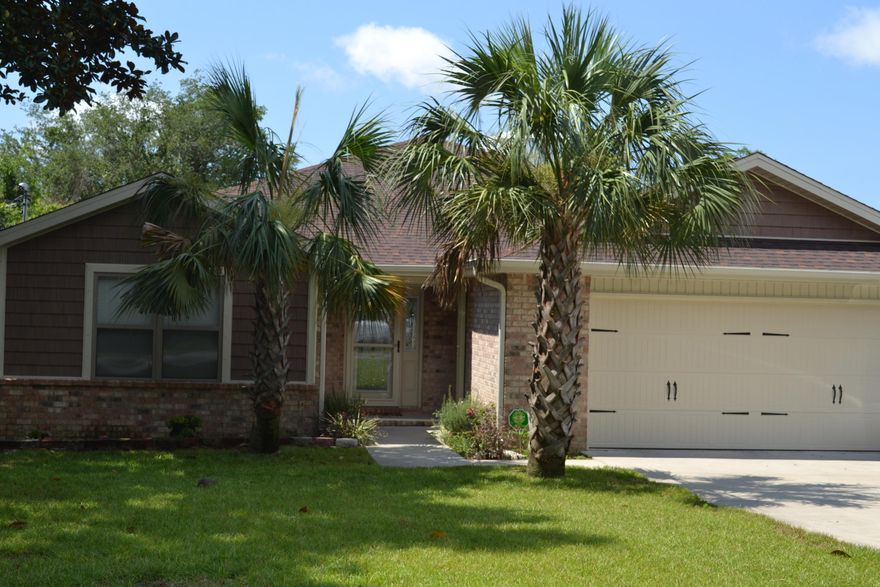 Never pay an expensive power bill ever again! HIGHEST POWER BILL IN THE LAST 6 MONTHS is $23.00. This custom built home features solar panels as well as several details that makes this home a must see! Huge backyard with plenty room for a pool. Pool wiring has already been installed. Custom hurricane shutters and doors. Large living and kitchen space is open, perfect for entertaining. Living room and master both boast tray ceilings. 2 car garage has plenty of space for 2 cars and a motorcycle, and storage. Home is clean and well maintained.Plus,close proximity to BOTH Eglin And Hulburt Base!