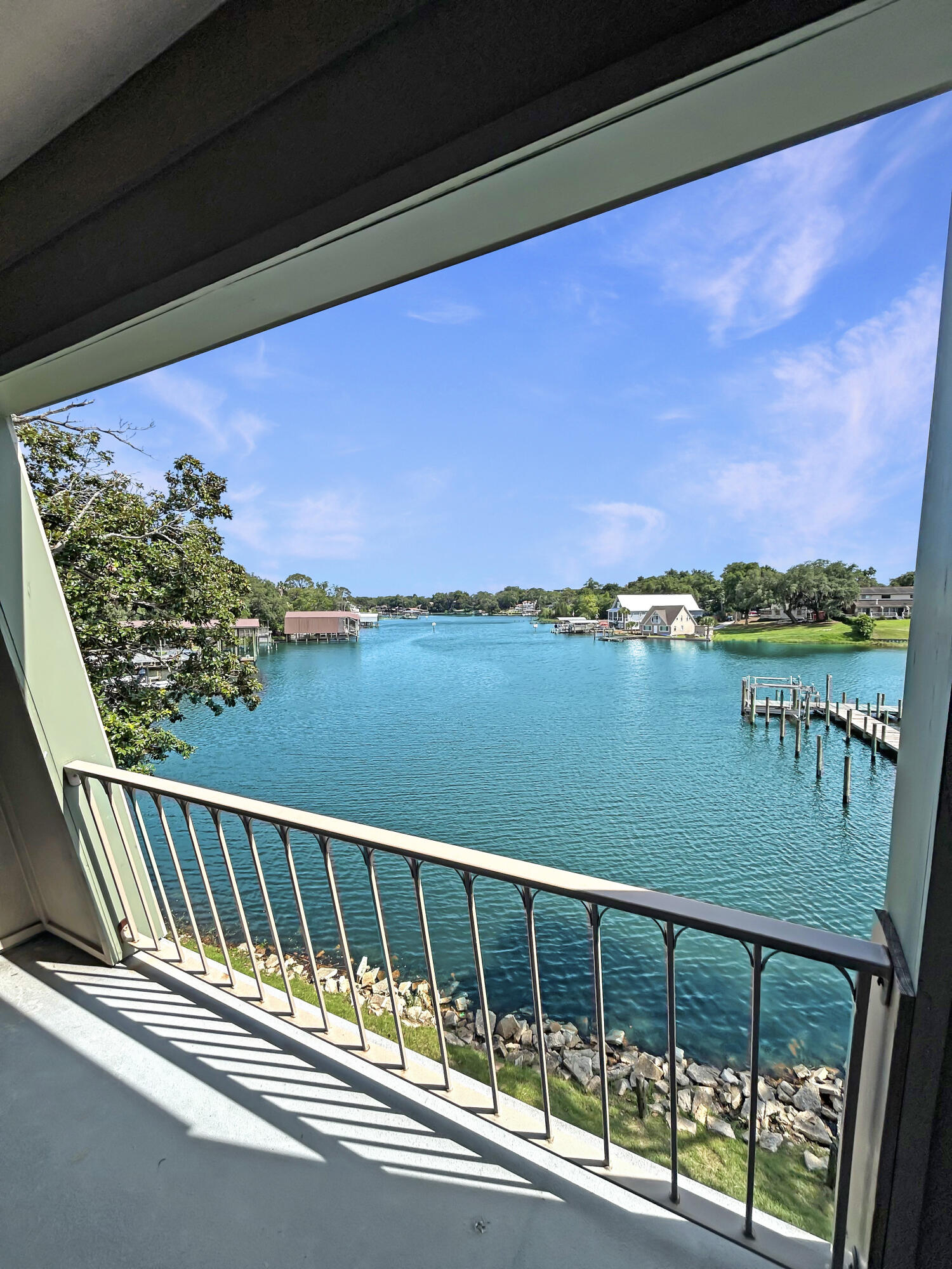 This fully rebuilt waterfront condo at Pier One is truly unmatched--no other unit in the complex compares. Completed in 2025, this 1-bedroom, 1-bath property offers breathtaking water views and modern, high-end finishes throughout. Enjoy brand-new electrical, plumbing, HVAC, roof, water heater, windows, doors, and appliances. Inside, you'll find quartz countertops, white shaker cabinets, luxury vinyl plank flooring, and custom trim with stylish shiplap accents. The real showstopper is the private balcony overlooking the bayou, where you can relax while watching dolphins, manatees, and pelicans right from home. This true waterfront unit offers peace, beauty, and daily connection to nature. The low HOA covers water, trash, insurance, pest control, and more. Pier One amenities include a bayfront pool, fishing dock, pickleball and tennis courts, and grilling area. Minutes from Eglin AFB, Hurlburt, shopping, dining, and beaches. A rare, turn-key waterfront opportunity.