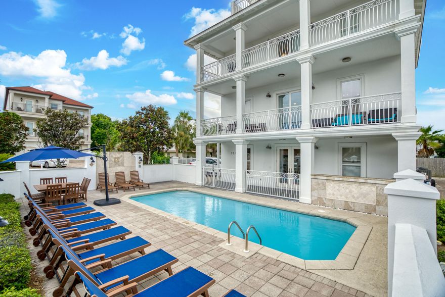 Are you looking for a rental POWERHOUSE??? This home is a wonderful investment opportunity! Super motivated Sellers! Primely positioned on a corner lot in Frangista Beach, this is a  high-performing rental property designed for large groups or multiple families. 2024 YTD grossed $127k! No HOA and just 2 blocks to deeded beach access. 8 Bedrooms with a 6 Bed Bunk room! Upgrades include 8 new king beds, new sofas, dining sets, barstools, light fixtures, artwork, and pool deck furniture. This floor plan accommodates up to 27 guests, featuring ample parking along the western edge. A privacy wall surrounds the pool deck, which includes a 10x28 private pool, covered grilling area, and poolside bar. Each of the first three levels features deep covered verandahs for enjoying gulf breezes. A living area with kitchenette off the pool deck, 3 bedrooms & ensuites, and a bunk room with 4 queen/2 twin beds are all located on the main level. The 2nd floor hosts 2 more bedrooms/ensuites, a living room, dining room set for 20, and a full kitchen with a breakfast bar for 6 more guests. Dual laundry rooms are on the first and third floors for added convenience. The 3rd floor hosts the primary suite with a private balcony and 2 additional bedrooms/ensuites. The top floor has a lounge area with foosball table and a sunset deck to capture the gorgeous views. Don't miss out on this exceptional opportunity!