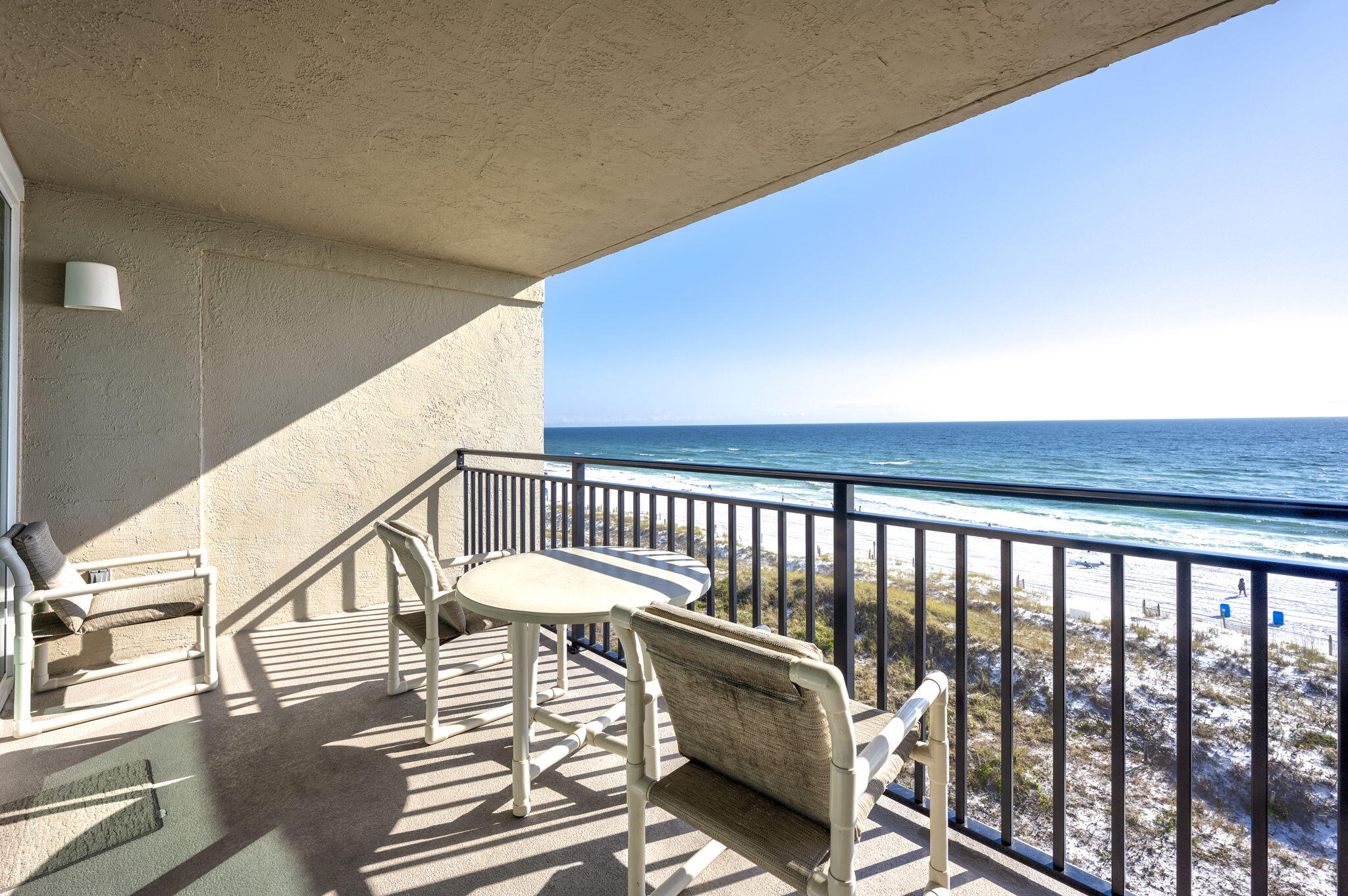 Discover the ultimate beach getaway with this stunningly remodeled 2 bedroom, 2 bath condo that boasts breathtaking views of the Gulf of Mexico. This unit comes fully furnished rental ready for you to purchase as your next vacation rental. Rental income 2024 $51k, 2023 $38k. The unit has been updated over the years with tile flooring, luxury vinyl plank flooring in the bedrooms, new paint, and furniture. The kitchen has gray cabinets, tile countertops, and white appliances. This unit has a washer and dryer inside the condo for your convenience. The Breakers complex does allow pets for the owners on the premises. The Breakers complex has great amenities to enjoy while staying there to include the pool, gym with a sauna, tennis courts, Shuffle boards, BBQ grilling area and private beach.