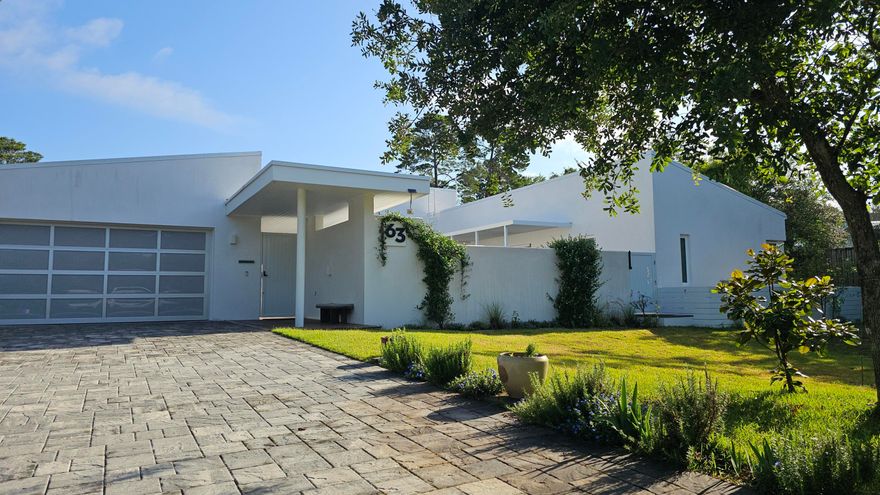 Step into this stunning AIA Honor Award-winning home offering sleek design and exceptional functionality. This 3-bedroom, 3-bath residence features a seamless connection to Starlink internet with an automatic Wi-Fi backup generator for uninterrupted service. The spacious master suite includes a walk-in shower and a floating toilet for a spa-like experience. Enter through a private, covered courtyard that opens to an inviting outdoor poolperfect for relaxing or entertaining. Enjoy breathtaking views from the rooftop terrace. Additional amenities include a two-car garage, in-unit washer and dryer, and smart, contemporary finishes throughout. Pets are negotiable. Resident Benefits Package (RBP) for $50.00/month which includes liability insurance, credit buildin, AC Filters.