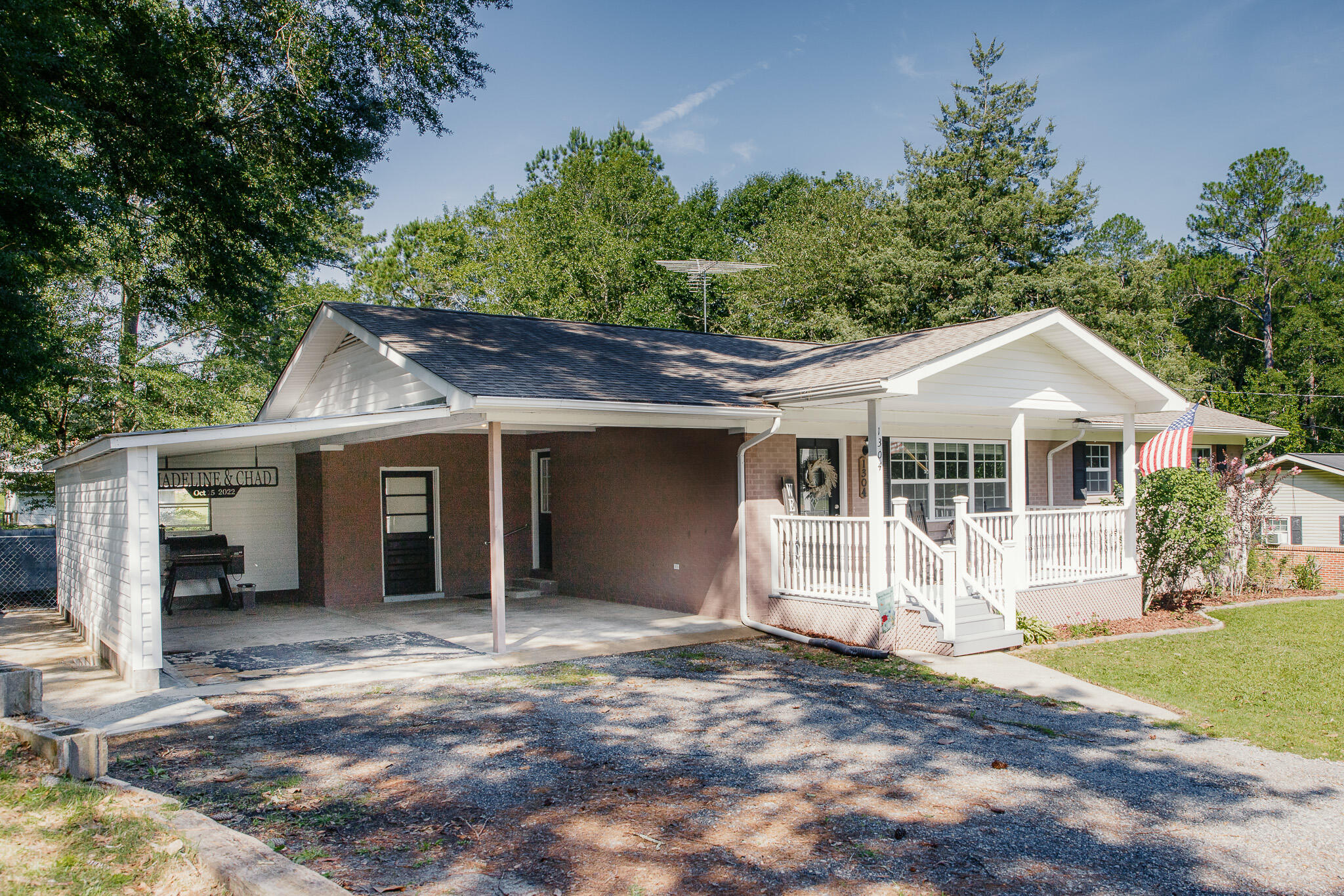 Attention buyers! This MOVE-IN READY COUNTRY RETREAT sits on just over half an acre and boasts NEW UPGRADES INSIDE AND OUT! Welcome to highly desirable GREEN ACRES; a neighborhood known for its peaceful atmosphere and SCENIC LAKE!. This ALL BRICK 3 BR/2 BATH home offers curb appeal with it's welcoming covered front porch and beautiful gardens!. Step inside to spacious living room with an open floor plan, neutral paint, crown molding and beautiful wood laminate flooring. The kitchen recently received a facelift and features newer appliances and brand new energy-efficient windows that fill the space with natural light. There's also a kitchen island with the coveted pot rack hanging above. The primary suite features crown molding, large windows and the en suite bath. There are two additional guest bedrooms with generous-sized closets and plenty of room for large bedroom furnishings. The guest bathroom was tastefully updated with a new vanity, timeless subway tile and stylish elongated ceramic tile flooring. Step outside to your deluxe-sized custom deck with room for the grill and large outdoor furnishings? Did I mention there's a pool? Yep! There's also a barbeque station, firepit, large mancave/she shed with power and lean to... and the entire yard is fully-fenced! BONUS: Indoor laundry with additional storage inside the carport. Other notable mentions... NEWER HVAC AND WATER HEATER, UPDATED WINDOWS THROUGHOUT, RECENTLY INSTALLED GUTTERS AND THE SELLERS ARE EVEN THROWING IN SEVERAL BOXES OF MATCHING TILE! #GiftsWithPurchase This one is priced to move! Better hurry! Don't wait-homes like this in Greenacres don't stay on the market for long. Schedule your private showing today!