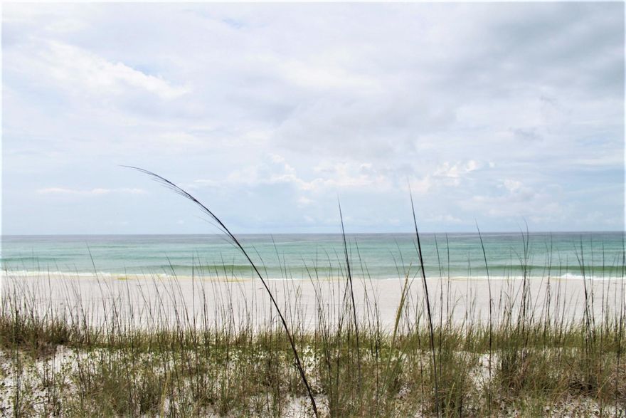 This property was previously a 4 unit townhome project which was destroyed during Hurricane Ivan.  The property is still platted for a 4 Unit Townhome project.Gulf Front Property on lovely Navarre Beach. Within 50 feet of Public Walkway (or build your own private walkway) onto the White Sands and turquoise Waters of the Gulf of Mexico. Within blocks of the Gulf Island National Seashore.