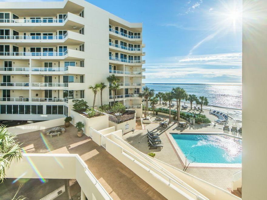 Your Dream condo has arrived! This 2 bed-2 bath sleeps 6 and sold fully furnished. It's known as the 'King of the East' with its GREAT Rental $$$ revenue numbers. View the emerald green waters and the soft white sand from the living room, kitchen,deluxe master bedroom, guest bedroom and all 3 deluxe balcony entrances. The large kitchen has been designed with the 'open concept' and boasts granite countertops, stainless steel appliances and a beautiful backsplash. The dining room seats 8 comfortably. The owner spared no expense on the rich furnishings found in every room. The oversized master bedroom has a bathroom with a large walk in shower and a private balcony entrance. The beach-side pool and steamy hot tub overlooks the water and makes the sunset 100% better! Reward yourself!