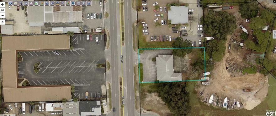 Exceptional  opportunity for a medical or professional office location in the heart of Destin's business district on Main Street. With an expansive reception and waiting area, the 3121sf interior has several office areas, 8 exam rooms, 4 bathrooms and a break room. Being centrally located, the building is convenient to all of the residents of Destin. Two-car garage in the rear. Buyer to verify all information for its particular use.