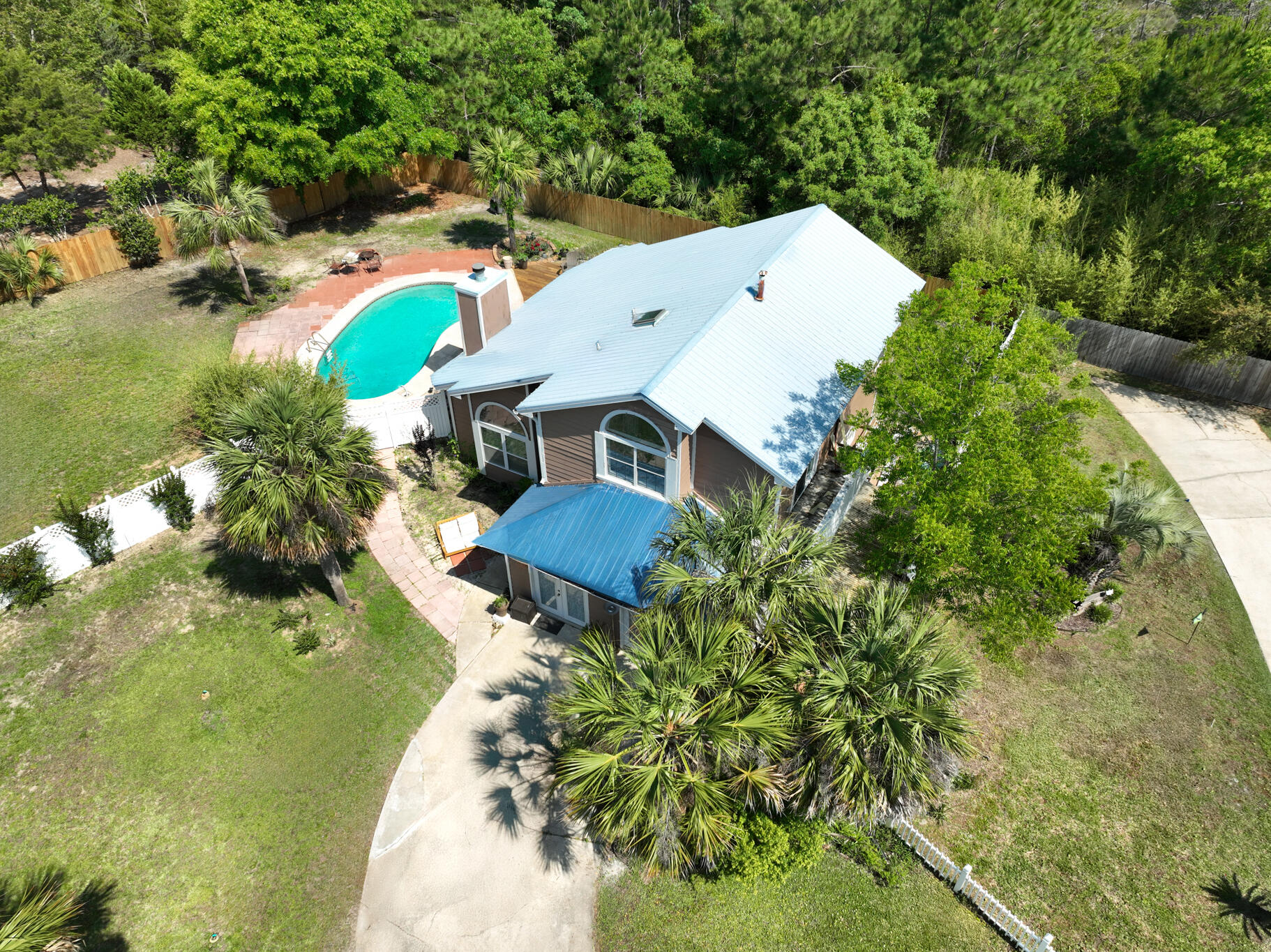 Welcome to Paradise Living! Great family home in sought after Waterfront Community! Extra large backyard features Gunite in ground pool along with a new privacy fence. Exclusive Waterfront Living; Discover unparalleled coastal elegance in this POOL home nestled in a sought-after waterfront community with deeded water access to the Sound. Designed for both relaxation and entertainment, this home boasts a gunite in-ground pool, large decks, new shed or workshop; Home features ceramic tile floors downstairs with new LVP upstairs; Kitchen features upgraded beautiful grey granite countertops, a gourmet kitchen with a 6-burner vented gas stove, Stainless appliances, Double convection oven, white cabinets, new back splash, track and drop lighting; Features: new vanities, new toilets, new LVP flooring upstairs; 7 large windows in the main living area give an abundance of light; Plus 2 bay windows in Living and Breakfast Area give cozy atmosphere; Large bonus room downstairs that is heated and cooled for additional room for entertaining friends and family; One of the upstairs bedrooms includes a bonus room attached; Full upstairs bath boosts new fixtures; the metal roof will add years and help on insurance; recent 4 pt and wind mit gave 20 more years to roof life; or low maintenance insurance costs; The master suite is a true retreat, featuring a Jacuzzi tub, double vanities; Cozy up by the wood burning fireplace, or enjoy the versatility of a separate playroom and additional living space downstairs. Bonus Room that is heated and cooled, could be converted back to a garage; All new wiring for pool pump, pool pump 3 years; New irrigation system with new box; Complete with a new fence, voluntary HOA, and ample space for family and guests, this home offers the perfect blend of coastal charm, modern luxury, and unbeatable access to the Sound. Don't miss this rare opportunity to own a home in a great water access community! Other Notes: The flooring has been changed throughout the house upstairs and downstairs with the exception of the small bedroom. The staircase has been stripped of carpet down to the wood and refinished. The irrigation pump was also replaced in 2023 along with all irrigation lines. Some windows have been replaced and a new sliding door off the master to the deck. New pool pump, water heater, condenser, garbage disposal, vanities, toilets and faucets: Entire wood fence around the property in the backyard replaced 2 years ago and treated with 6 yr water proofing as well as the decks. Complete new siding on chimney. Replaced exhaust fans in BR and all water shut off valves and hoses in 2025.
Water Heater 2020; HVAC condenser 2023; Irrigation Pump 2023; New Pool pump - 2018; Roof Metal;
Voluntarily HOA. $$225 annual fee. Community Beach (HOA
Come view this home in a great subdivision of Emerald Point!