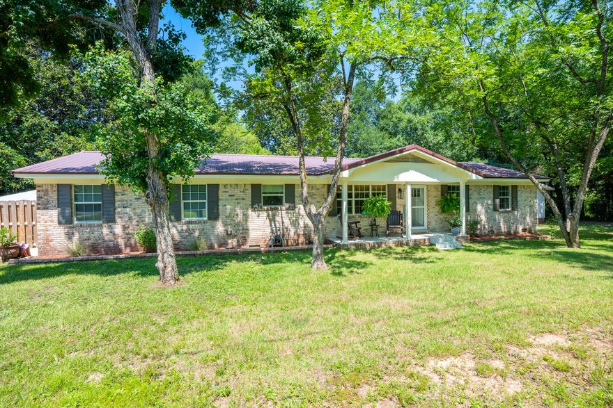 Charming Farmhouse-Style Retreat with Income Potential - A Hidden Gem Near Downtown!Welcome to this one-of-a-kind, cozy farmhouse-style home nestled on a beautifully private .34-acre lot surrounded by mature trees, offering a peaceful escape just minutes from the heart of downtown. This property blends rustic charm with modern convenience, making it perfect for homeowners and investors alike.Step inside to discover a bright, open-concept layout featuring a modern kitchen, spacious dining area, and a warm, inviting living room--ideal for entertaining or relaxing in style. The thoughtful design flows effortlessly, creating a space that feels both airy and intimate.One of the standout features of this home is the separate guest/in-law cottage offering excellent  income potential. Whether you're looking to host guests or generate rental income, this flexible space adds incredible value.

Outside, enjoy the serenity of your private, tree-lined lot, perfect for morning coffee, gardening, or simply soaking in the natural beauty. Despite its tucked-away feel, you're just steps from shopping, public transportation, and all the amenities downtown has to offer.

( Highlights:

Cozy farmhouse style with modern updates
Open kitchen, dining, and living areas
Private guest nook/in-law suite with income potential
Lush, tree-lined .34-acre lot
Prime location near downtown, shopping & transit
Truly one-of-a-kind property!
Don't miss your chance to own this rare blend of comfort, charm, and convenience. Schedule your showing today!

