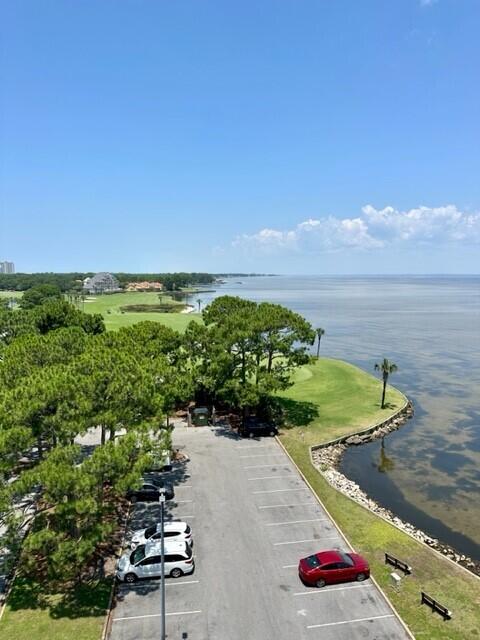 MUST SELL ... ESTATE SALE! RARE CORNER TOP-FLOOR unit with BOTH resort and Bay views! Entirely renovated & upgraded with oversized white ceramic tile floors, tastefully decorated & accessorized, a walk-in shower with beautifully tiled walls, 36'' bathroom vanity height, smooth ceilings & walls, freshly painted throughout, granite in both the bathroom & kitchenette, custom cabinetry and black out drapes. Enjoy the beautiful Bayfront Pool! Bayside is conveniently located near the Linkside Conference Center, Sunset Bay CafA(c), Sandestin Fitness Center, Salon & Day Spa and Links Golf Course. Onsite tram to Beach and the Village of Baytowne Wharf. All utilities paid through the quarterly Association fee. The Sandestin Golf and Beach Resort is a 2000+ acre resort with amenities that include a beautiful private beach, four championship golf courses, full service marina, tennis facility, nature trails, bike and walking paths, restaurants, daily live entertainment, shops and much more. Not your average unit at Bayside!