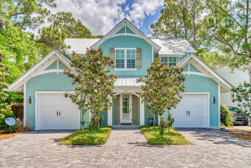 Well-appointed with custom features and exquisite architecture, 373 Lakewood Drive is a turn-key custom home completed in 2014. This one owner sophisticated property includes 3054 sq ft of perfectly crafted and planned living space that may only be topped by the outdoor living areas that surround like a true beach oasis. When entering the oversized welcoming foyer leads your eyes to a custom barrel vault ceiling and through to the great room. A chef's dream kitchen featuring double GE Monogram ovens, a 6 burner cooktop with griddle, and microwave drawer are among the many curated selections. Two sets of french doors and ample windows allow the beauty of the outside to shine through into the great room. A custom stucco gas fireplace adorns the great room and adds to the tasteful ambiance.
