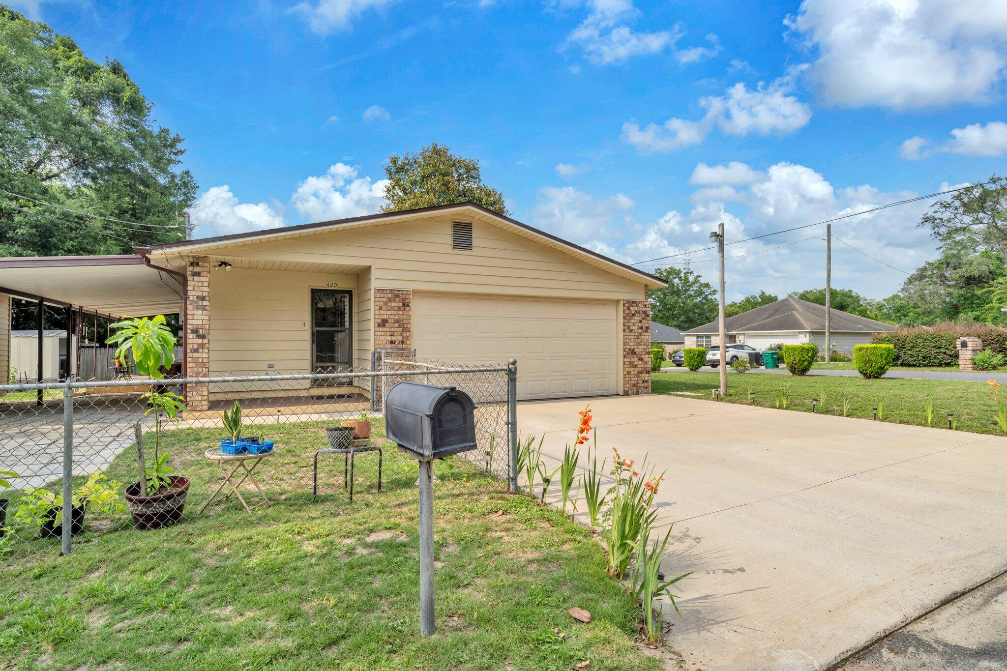This charming 3-bedroom, 2-bathroom ranch-style home offers 1,347 square feet of comfortable living space on a 7,177-square-foot lot. the property features a brand-new composition roof, ensuring durability and peace of mind for years to come.The interior boasts a cozy fireplace, a jetted bathtub in the master bathroom, and a well-appointed kitchen with modern appliances. Additional amenities include a 2-car attached garage, a carport, and a fenced backyard, perfect for outdoor activities. Located in the heart of Niceville, this home is conveniently close to schools, shopping, and recreational facilities