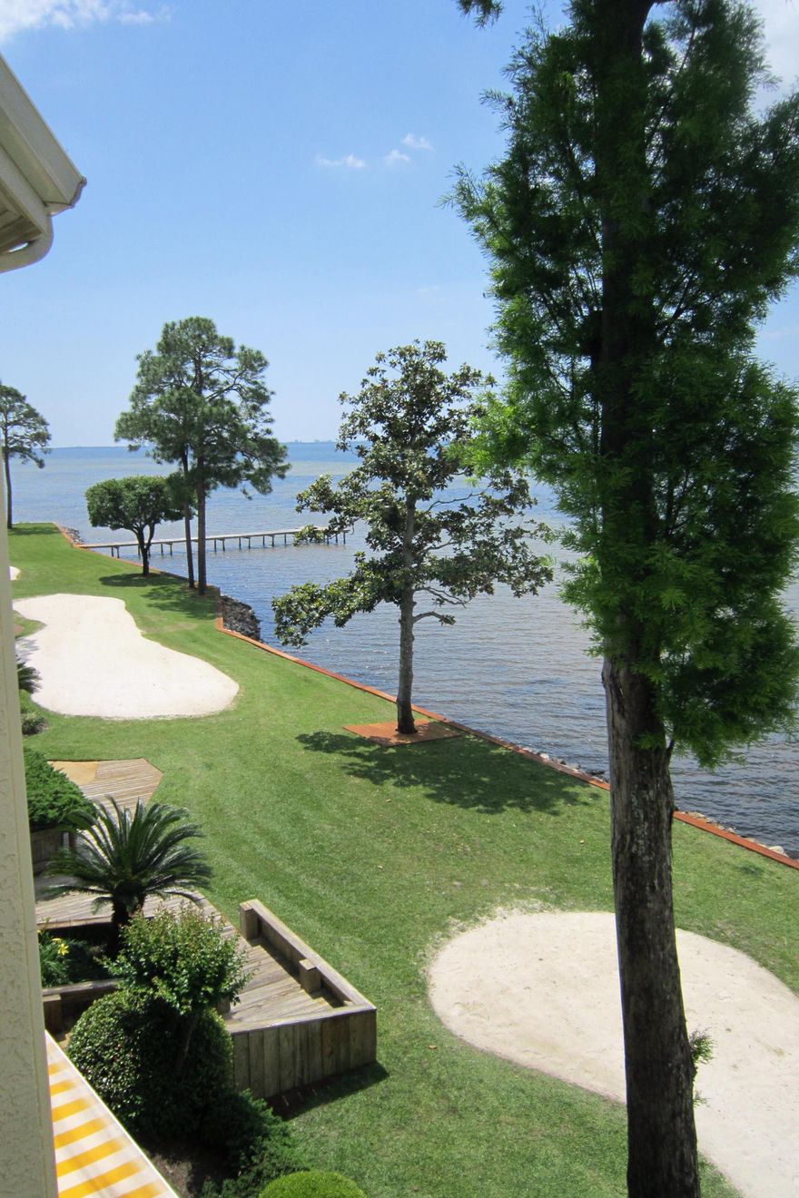 One of the Best views across the Bay towards Destin .. Enjoy the endless sunsets from living room, balcony, or master bedroom .. This fully furnished Bayside Villa features vaulted ceilings .. with the 2nd bedroom upstairs .. and opens into the space below.Please call listing agent for showing instructions.
