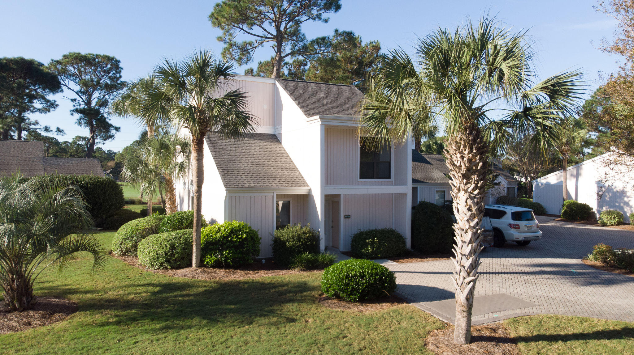 Looks like a detached house- however Setup as Condo per County/Association. Interior Freshly Painted and windows replaced (in Nov 2018). Linkside Golf Course Views in popular Sandpiper Village in the world renowned Sandestin Golf & Beach Resort. UnFurnished with 3 bedrooms on 2nd floor (large enough that kingsize bed fits in each) ~ BONUS Room on first floor was used as bedroom (can be den or media room). Full bath on first floor. Two owners closets inside and one owners closet outside. Updates since 2013 include - roof , electrical, hot water heater , ext HVAC unit, ceilings scraped, some plumbing. House is in a Condo Association which cares for roof, exterior walls and grounds. Owner cares for interior (walls in). Washer/Dryer convey. Call for your private showing today~