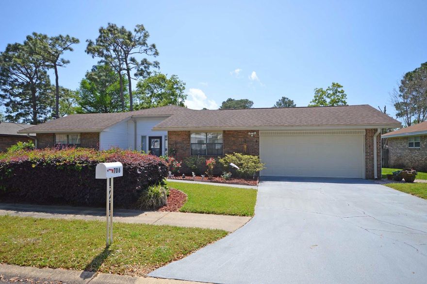 Exceptional Listing in established community of Tanglewood with 1708 Sq. ft., 3 Bedrooms, 2 Baths with nice upgrades, brick front, vinyl siding on 3 sides with great landscaping, plush foliage and many features to follow. Just minutes from Hurlburt Field andEglin Gates a very desirable location. Kitchen and baths are updated. The Floor plan flows easily through the home with large family room, great large kitchen space with extremely gracious dining room adjacent to the fireplace and large kitchen with breakfast bar, nice nook with extra cabinets and corner seating area. Kitchen features smooth top electric range, microwave, dishwasher, and refrigerator. Master has a great new walk-in shower tiled and features comfort seat, tile floors, upgraded lighting.
