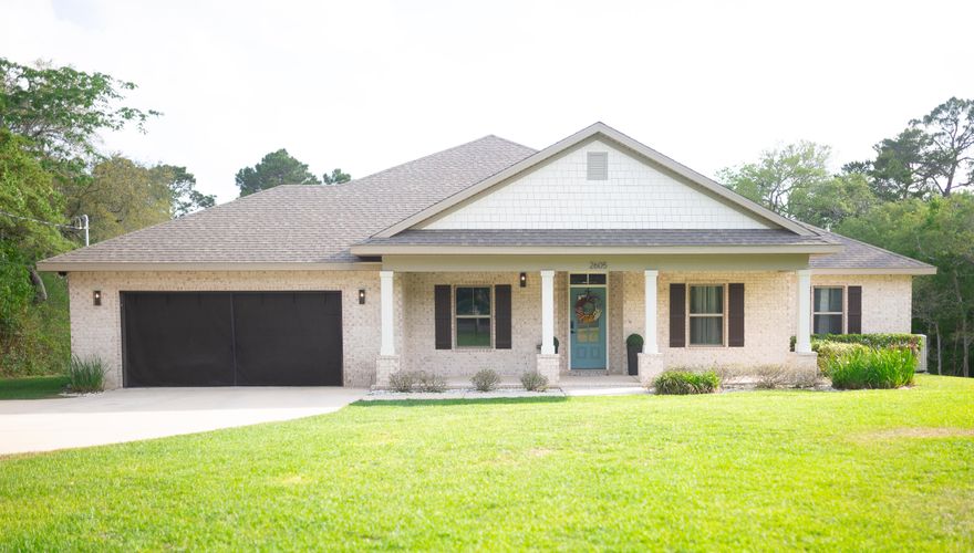 Spacious 4-bedroom, 3-bath residence on one acre in Tom King Estates, located at the end of a quiet cul-de-sac with no HOA. This home makes perfect use of all 2,716 sq ft, featuring 13-ft  ceilings in the open-plan living area and 9-ft ceilings elsewhere. Tile flooring and a custom feature wall bring elegance to the main living spaces. The kitchen and baths boast granite countertops; the kitchen is equipped with stainless-steel appliances, including a double wall oven, a large island, and a tile backsplash. A dedicated media room provides an ideal space for entertaining or family movie nights. Step outside to a covered back patio overlooking a private, expansive backyard. Throughout, quality craftsmanship and upscale finishes combine functional layout with style and comfort.