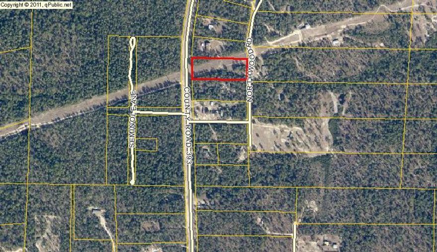 Affordable home site with paved road frontage on Highway 393. Their is a power line running diagonally southeasterly from the NW corner to approximately the midway point on east line. The place to put a home would be on the back part of the property, fronting the private, dirt/clay Northwood Rd (not maintained by the county). There is a drive to the back side along the power line. Minimal restrictions allow for mobile homes and horses; see Restrictive Covenants. Water and electric are available but not on site. Auburn Water is believed to be available-please verify utility information to your satisfaction. The owner was told a mobile home used to be on the property but has no records to verify. There is a water meter on Hwy 393; looks like it is near the NW corner. Take a look today!