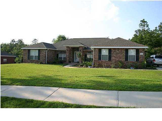 Nice and spacious home in the desirable neighborhood of Silver Oaks. French doors grant access to the formal living room, dining room and the back patio. A gas fireplace gives accent to the large living room with cathedral ceiling. The floor plan is a split bedroom. The master bedroom is a nice size and the master bathroom has a separate shower and whirlpool tub and features 2 walk-in closets and a double vanities. The three other bedrooms are generous in size and the laundry room comes with a utility sink and built-in cabinets. This home also has a beautiful eat-in kitchen that features custom maple cabinets, a center island with sink and breakfast bar, stainless steel appliances, ceramic tile and Corian solid surface countertops. There is also a community pool