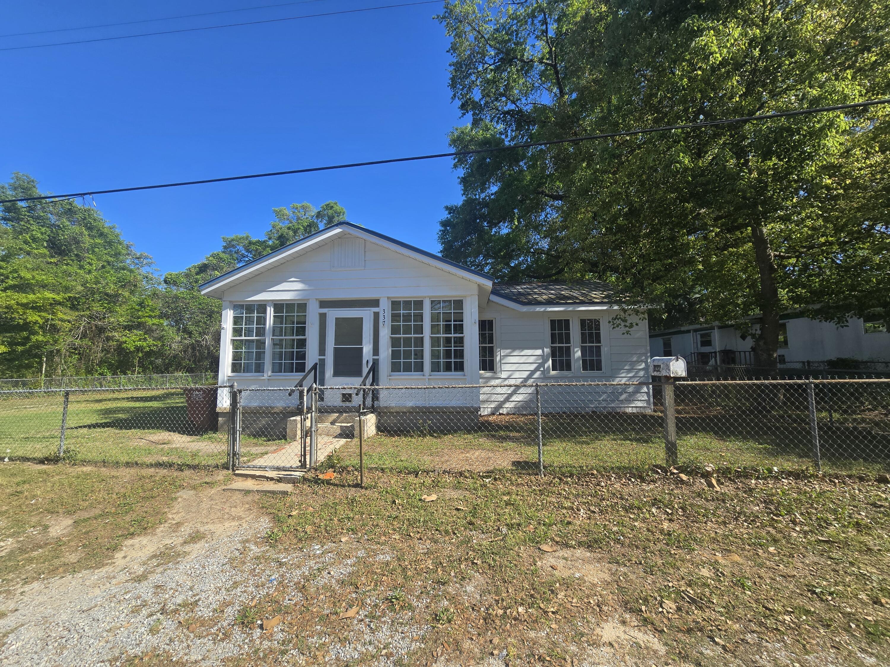 Stop by and see this recently renovated home in Crestview! It still has the old charm but updated with modern amenities. The whole house has been updated with new LVP flooring, carpet in bedrooms and fresh paint! The kitchen has been updated with new stainless steel appliances, cabinets and granite countertops. New HVAC system was installed along with a new gas hot water heater and the whole house rewired.