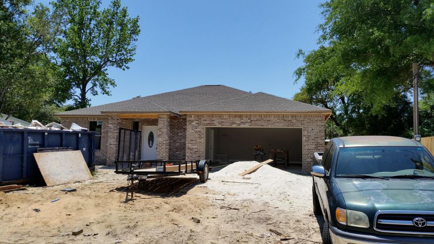 Home is 1,983 sq.ft. heated and cooled, full brick exterior, 9' ceilings throughout, granite counters, stainless steel appliances, raised panel cabinetry, low-e argon filled vinyl windows, 5 1/4' baseboards, crown molding throughout living areas and master bedroom, master bath walk in shower, master bath garden tub, dual vanities in both bathrooms, privacy fenced yard, lawn pump and sprinkler system, large covered patio, fully sodded, etc. House is currently under construction, expected completion is 04/2016.