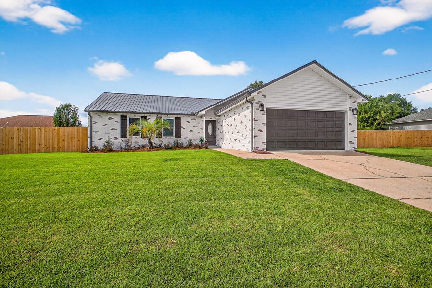 Beautifully Remodeled  - Move-In Ready Home! This stunning remodeled  home offers stylish upgrades perfect for relaxing, entertaining, or simply enjoying every day in comfort and style. Step through the front door into a bright, open-concept living space with fresh paint, luxury vinyl plank flooring, and abundant natural light throughout. The fully updated kitchen includes new stainless steel appliances, quartz countertops, modern cabinetry, and a large island with seating--ideal for hosting guests or enjoying casual family meals. The home features 3 spacious bedrooms and 2 beautifully renovated bathrooms. The backyard is fully fenced and features new landscaping, creating a peaceful, low-maintenance retreat. Located in Fairchild Estates  an established community  just off of highway 90 which provides easy access to Eglin AFB and Duke Fields. This turn-key home offers the perfect blend of modern living and outdoor enjoyment. Don't miss this rare opportunity to schedule your showing today and fall in love with this beautiful property!