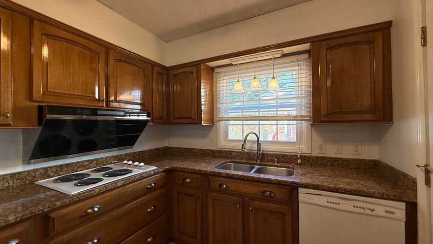 This home checks all of the boxes! Discover comfort, character, & convenience in the heart of Niceville!This 3-bedroom, 2-bath home offers 1,506 square feet of updated living space w/modern touches. The kitchen features rich wood cabinetry, granite countertops, & plenty of prep space. A sun-filled Florida room provides an inviting place to relax, overlooking the privacy-fenced backyard--ideal for gatherings, pets, or quiet mornings w/coffee.Enjoy peace of mind w/a metal roof, powered workshop, & 2-car garage providing storage galore. Located in a well-established neighborhood less than half a mile from Niceville High School & Ruckel Middle School, this home is close to parks, shopping, & all the conveniences.