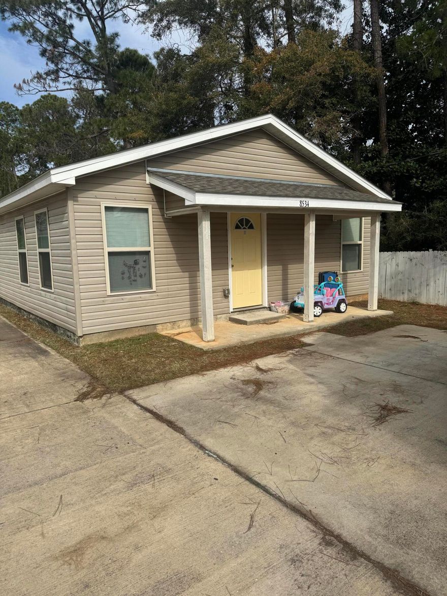 Great Starter Home or rental investment located about 2 miles to Navarre Beach. Offering 2 Bedrooms,  2 Baths with an open floor plan. Kitchen has granite countertops.  Short term rentals allowed. Property to be split prior to closing. Sale is for 8534 Laredo only.  Parcel ID and Legal description will be updated.