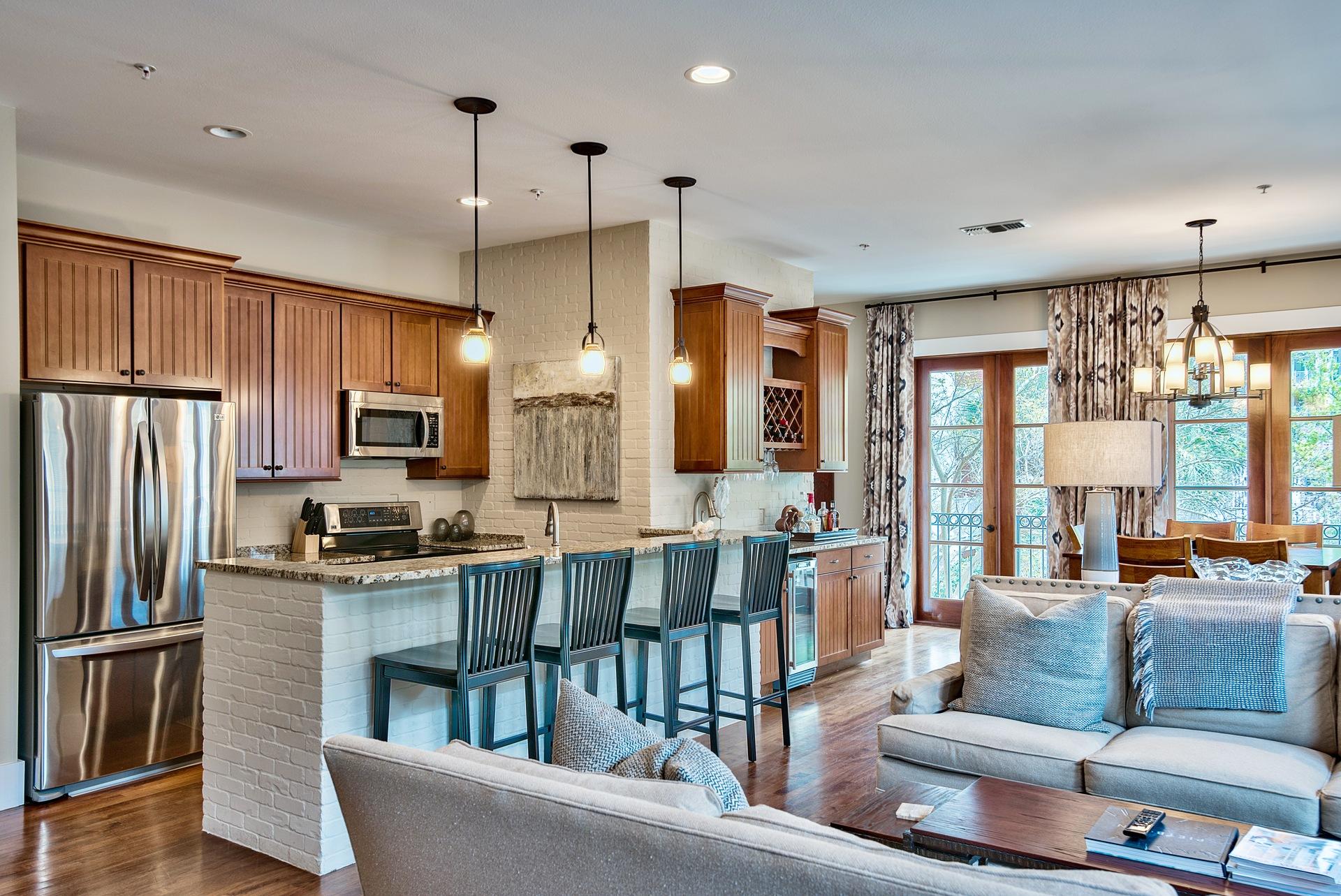 This impressive loft is over the shops in the Village of Baytowne Wharf. Enjoy high ceilings and an open floor plan that shows off the urban style including hard wood flooring through out and brick accent walls. The mahogany french doors wrap around the balcony to overlook Tupelo Courtyard and the retail shops below. Conveys fully furnished and ready to for you and your family.Fishermans Village owners have exclusive access to the lushly landscaped amenities terrace featuring a resort style pool, hot tub, fitness center, lawn, and lovely grilling area as well as to the the Founders Club, featuring a game room with pool table and bar and a balcony overlooking the events plaza.