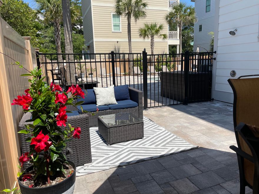 NO HOA DOUBLE LOT! Rare opportunity to own this double lot gem with oversized PRIVATE salt water heated pool/ hot tub just steps to Gulf Coast, shopping and restaurants. Proven rental history with rave reviews!This beautiful 3 story 4 Bdrm 3.5 bath home with outdoor shower is a vacation dream! Private balconies off second and third floors front bedrooms with views of Gulf Coast! Open concept main floor living area. Laundry on second floor. Tile floor and granite countertops throughout. Stainless steel appliances. Rinnai tankless hot water system. Irrigation system with drip lines throughout patio area. Insulated floors for sound proofing. Remote Wi-Fi  Hayward system for pool. Control heating of pool/hot tub etc from an App! Fire safety lights by staircases. Parking for 3Lg one small.