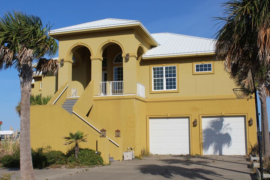 Beach front home on the Santa Rosa Sound with sunset views! This luxury Mediterranean home is an REO. It has 2774 sq ft with 3 bedrooms and 2.5 baths. Enter the home on the main floor into a foyer with beautiful, decorative tile floors. The tile flooring is throughout the entire main floor on the home. The home features and open floor plan with the kitchen opening to the eat-in dining area, and the living room. All of these rooms have views of the Santa Rosa Sound. The home features large, covered, balconies overlooking the sound. The custom kitchen features stainless appliances and granite counter tops. There is a double wall oven, gas cook top, built in microwave, and dishwasher. Buyer to verify all dimensions and information.