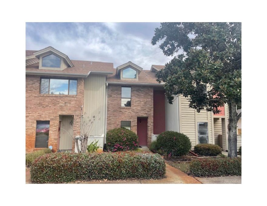 Magnolia Bay Townhomes rarely become available and is one of only six attached townhomes surrounded by lush landscaping and mature magnolias. First level has a very spacious living and dining area. Two large closets, one being used as a pantry and one is equipped for a full size washer and dryer. The master suite is on the second level and has a large adjoining deck overlooking the pool. A guest suite with a private bath is also on the second level. Third level has a bonus room. Freshly painted walls & ceilings, new window cills. Floor has been ripped up and could use a little TLC. Conveniently located close to close to shopping, schools, restaurants, attractions and,the bay! Ownership also includes 1/6 ownership in the lot just west of the pool and north of the building.