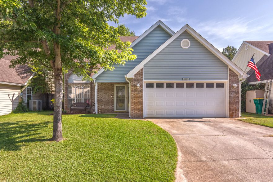 Nestled in the perfect location, this peaceful 4 bed, 2 full bath lakefront home checks all the boxes. Open kitchen, complete with a shiplap wall, stainless appliances, white cabinets, full pantry and large double window! Cathedral ceilings and a trendy fireplace grace the living and dining. Diagonally set tile, and wood laminate in all living and bedrooms, as well as large closets, double pane windows, and ceiling fans. The spacious master is located on the first floor, and features a split double vanity. Lush landscaping in both front and backyard, sprinkler system, well pump. Fish in your backyard from the stocked lake! Great for pets with the full fence. New exterior siding, keyless entry, ring doorbell, french doors, as well as an epoxy coated porch perfect for BBQ!