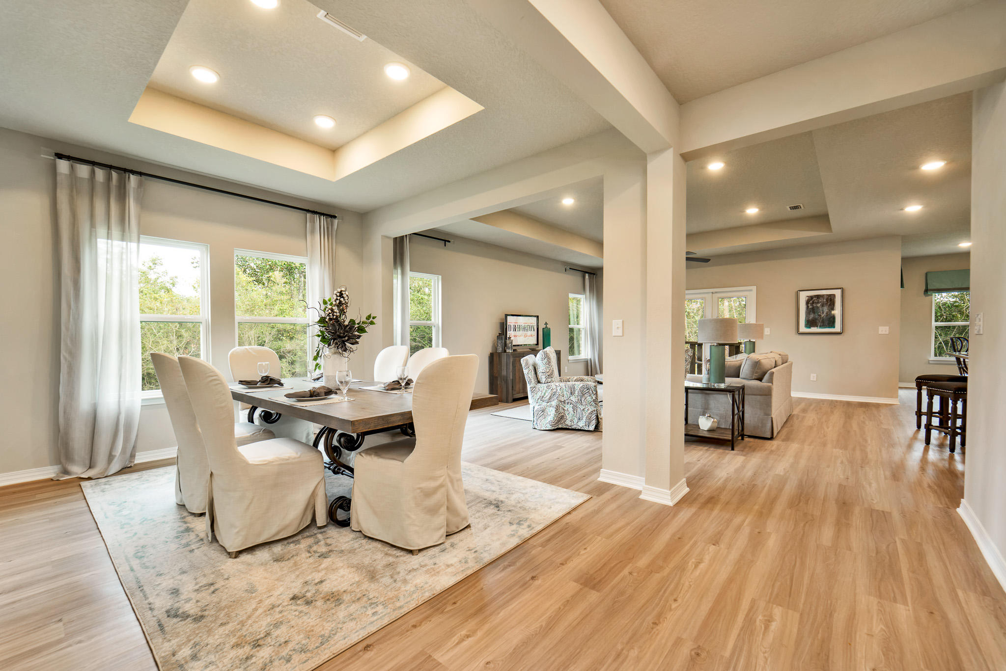 The Camden is a stunning 4 bed, 3.5 bath, 3 car garage floorplan located in Ocean Estates. Interior features of the Camden include EVP flooring throughout the common areas and plush carpet in the bedrooms. Just off the foyer is two bedrooms with a shared bath, double sink vanity and shower/tub combo. Trey ceilings are in the dining room, large living room, study and bedroom 1. The kitchen has a center island with a sink, a corner pantry and appliances which include a stove, microwave and dishwasher. Bedroom 1 features a large bath with a garden tub, separate shower, and a large walk-in closet.