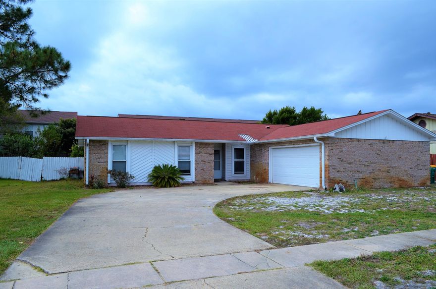 Come home to Destin...
This house sits on a quiet cul-de-sac street in the heart of the action! With three bedrooms, two baths, and open living space...update this home, make it yours, and it will love you back!
Gather around the wood-burning fireplace on cool evenings, or toss the ball around in the large back yard before dinner. Relax on the over-sized screened-in back porch with friends and family, or just enjoy the tranquility of the quiet neighborhood.
Call to day to schedule your private showing.