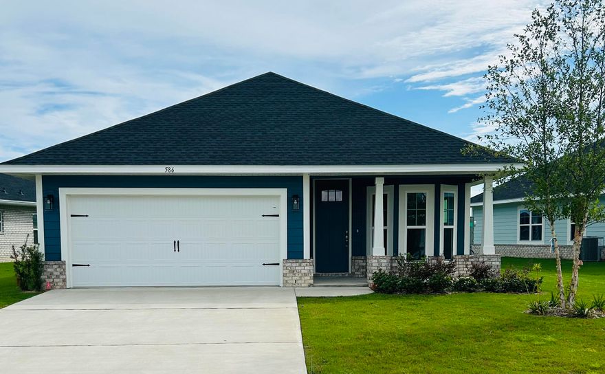 Limited-time offer: Receive up to $35,000 price discount on this home. Ask about our 3.99% interest rate buy down promotion with our preferred lender. Community also has USDA financing with zero down payment for those that qualify. THE BLUFFS is a new Freeport subdivision located just a 20 minute drive to South Walton beaches!  Craftsman style, 3 BR/2 BA home with Hardiboard siding and brick skirt. The interior features 9' ceilings throughout, and 10' trey ceilings in the Living Room and Master Bedroom.  Bay window delivers a sunny dining /flex room.  8' entry doors, quartz countertops and durable CoreTec Pro Plus LVP flooring throughout.  Oversized owner's suite with large walk-in closet. *Some photos have been virtually staged to illustrate the property's potential.*