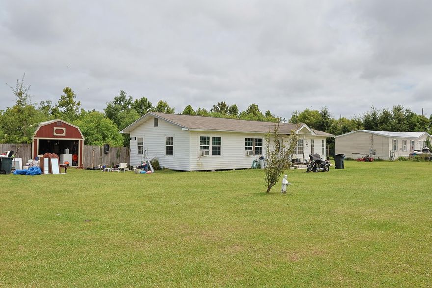 Located just minutes from Tyndall Air Force Base and a short drive to Panama City, this 3-bedroom, 1-bath home offers approximately 1,350 sq. ft. of living space on a spacious lot just under an acre.  Seller will not make any repairs and is selling AS-IS. The property requires significant cleanup and repairs but is priced well below comparable homes in the area to reflect its condition. This is a great opportunity for investors or those looking for a renovation project with strong potential. The generous lot provides plenty of room for outdoor storage, parking, or future improvements. Buyer to verify all pertinent information, including measurements and zoning. Shed does not convey. Call to schedule you showing.
