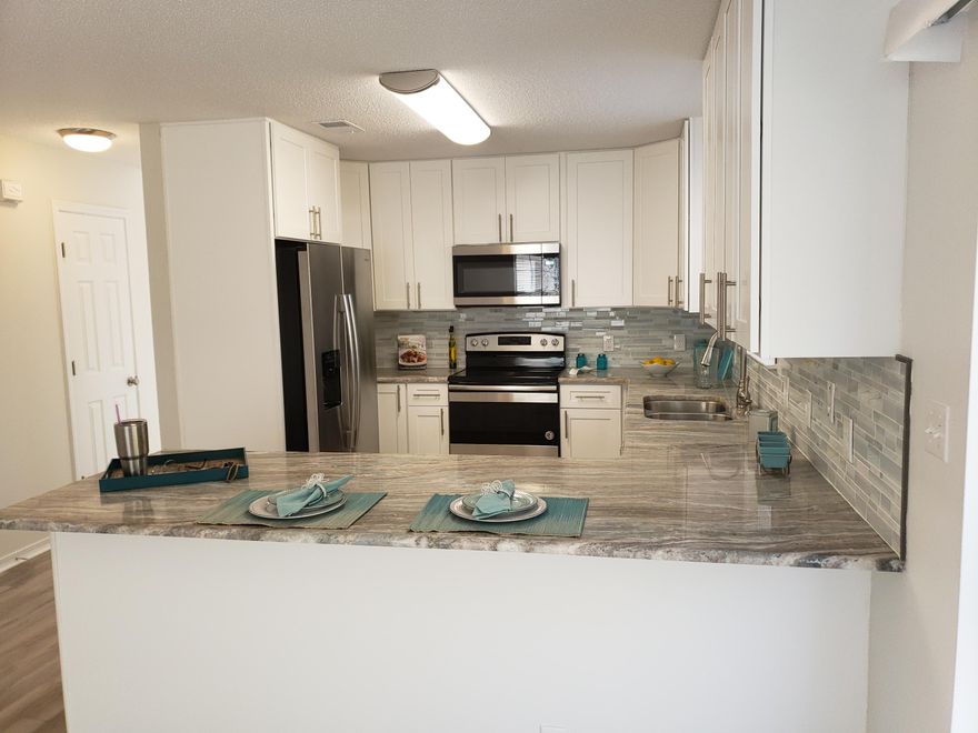 Short walking distance to public Intracoastal access, at end of Joybrook, Amazing 4 bed, 2.5 bath home located less than 1/4 mile from Santa Rosa Sound Water Access in the charming neighborhood of Ivalea Gardens. Fully renovated throughout with spacious NEW kitchen and stainless steel appliances, quartz counter tops, plenty of cabinetry and accent lighting, along with a bedroom that can double as an office, a half bath, and a large dining area. Other updates include brand new light and fan fixtures, new laminate floors and carpets throughout, and a new garage door. Additionally, the main floor comes with vaulted ceilings and extra storage under the stairwell. Second Floor has the Master and two additional bedrooms and 2 full baths