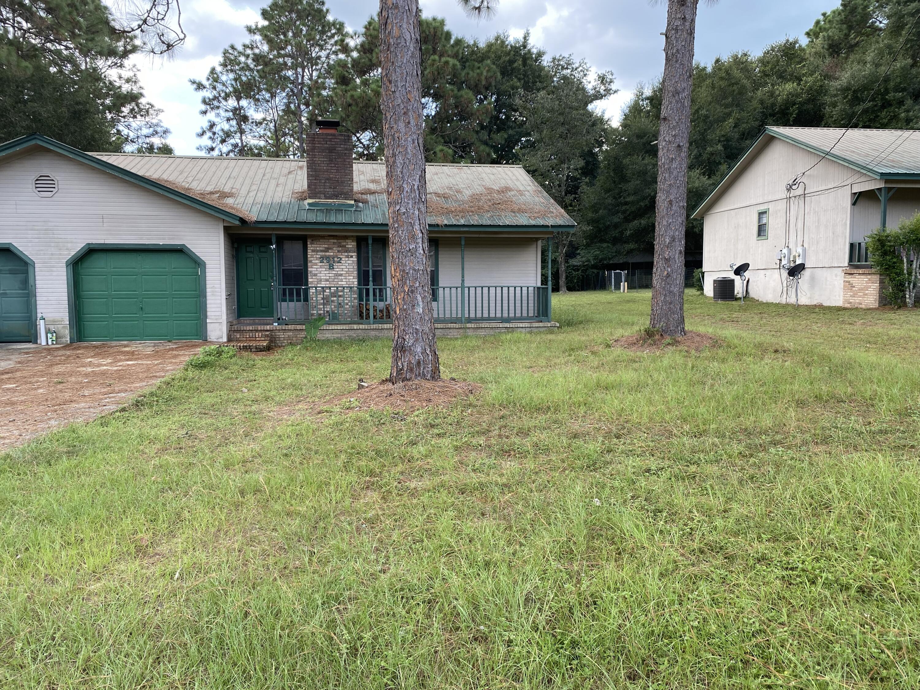 Efficient 2 bedroom 1 bath located in north east Crestview.  As you enter you will notice the cozy wood burning fireplace.  Just to the left you will find the handy kitchen with a full size pantry.  To the right you will notice the 2 bedrooms and one full bath.  Both bedrooms have nice size closets and are separated by the bath.  Nice size back yard and small concrete patio for entertaining family and friends.