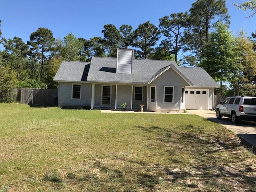 Great 3 bedroom 2 bath, home located within an easy commute to all local bases, beaches and shopping. Sitting on a half acre this home provides plenty of space for a pool, another shed and lots of room for the kids and pets to run. Wood burning fireplace in the living room makes for a great entertainment area. Updated kitchen with stainless appliances, granite counter tops, ceramic tile floors and a spacious nook for dining. Brand new insulated windows and porcelain tile floors throughout. Let's set up your showing today!