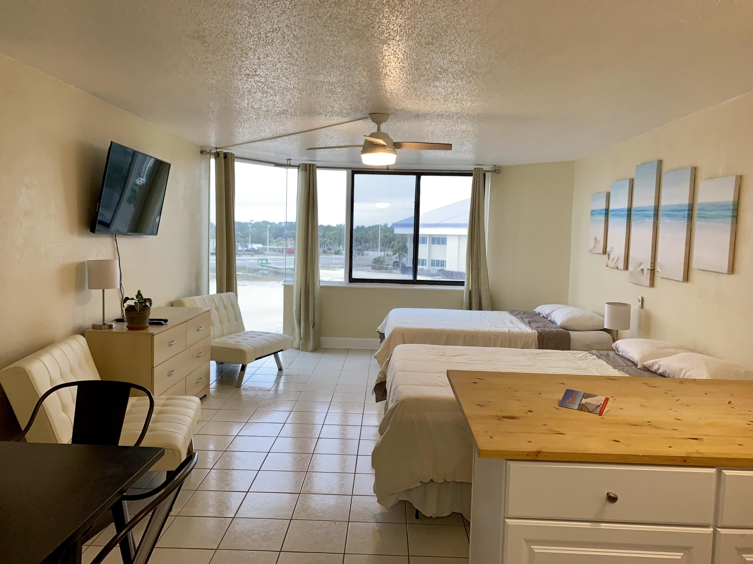 Great opportunity to own in Top of the Gulf Condominiums. Perfect condo to get away to or rent out for investment. Open and light unit with great sunset Gulf view. Lots of amenities Pool shuffleboard,arcade, fitness center,Internet lounge, snack bar+++ Own your piece of the beach for just $134K