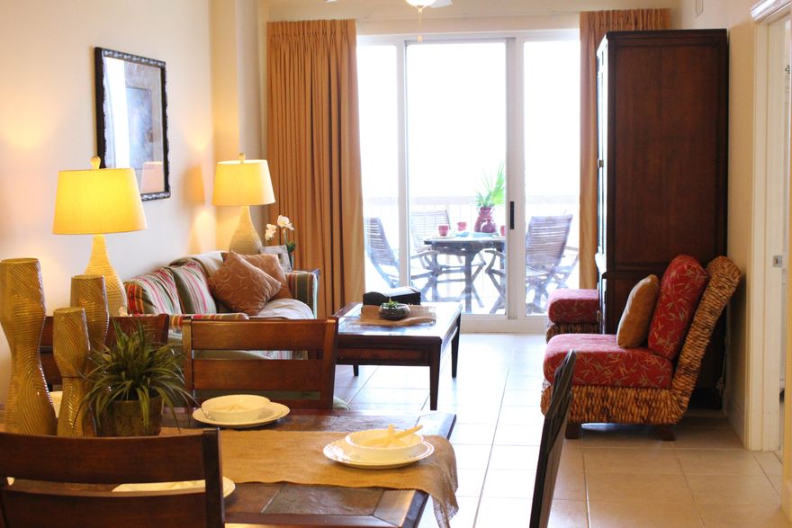 AWESOME MID FLOOR LEVEL CONDO IN THE VERY POPULAR SUNRISE BEACH!!! This 2 bed/2 bath with a bunk room is in one the most desirable locations in the building, the 10 stack. While on a lower floor, you are west of the splash area so you you can see the sand along with the water, also avoiding much of the noise! This condo also includes a exterior storage locker which is only available to the 01,02,03,9,10, and 11 stacks. These owners have taken extreme care of this condo, and it was never rented until 2012. Upgrades include 18'' tile floors in the living room, kicksplash under kitchen bar, and Jacuzzi tub with separate walk in-shower. Separate walk in laundry room!