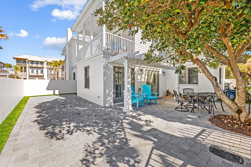 Located in a gated community on the south side of County Highway 30a, this turn-key & newly renovated abode is both an idyllic beach retreat and a powerful rental property boasting more than $70,000 in base rental income in 2022 that included owner usage during peak season. Located steps away from the emerald green waters of the Gulf of Mexico, Sunset Beach #26 is a two bedroom, three bath property that includes extensive recent upgrades such as a new roof (2020), fresh exterior paint, new washer & dryer, new appliances throughout the kitchen, and cosmetic upgrades throughout. The property greets its guests with an open floor plan that maximizes every inch of its 1,230 heated and cooled square feet. The first floor living area is spacious and includes an ample 20'x16' living room along with a spacious kitchen that boasts stainless steel appliances, granite countertops, and a brand new backsplash. Recent upgrades to this property include new tiling in every shower, new flooring throughout the unit, a new tile backsplash in the kitchen, new pavered driveway, turf along the side yard, and new furnishings that convey with the sale of the home. The second story has two private suites complete with ensuite baths and private balconies. The outdoor living space totals over 230 square feet and allows for a unique beach ambiance due to the close proximity to the water. This property is also ideally situated within walking distance to both Alys Beach and Rosemary Beach along with the world class shopping and dining opportunities that East 30a offers and lies directly south of the shopping and dining hub located at Peddlers Pavilion in Seacrest Beach.