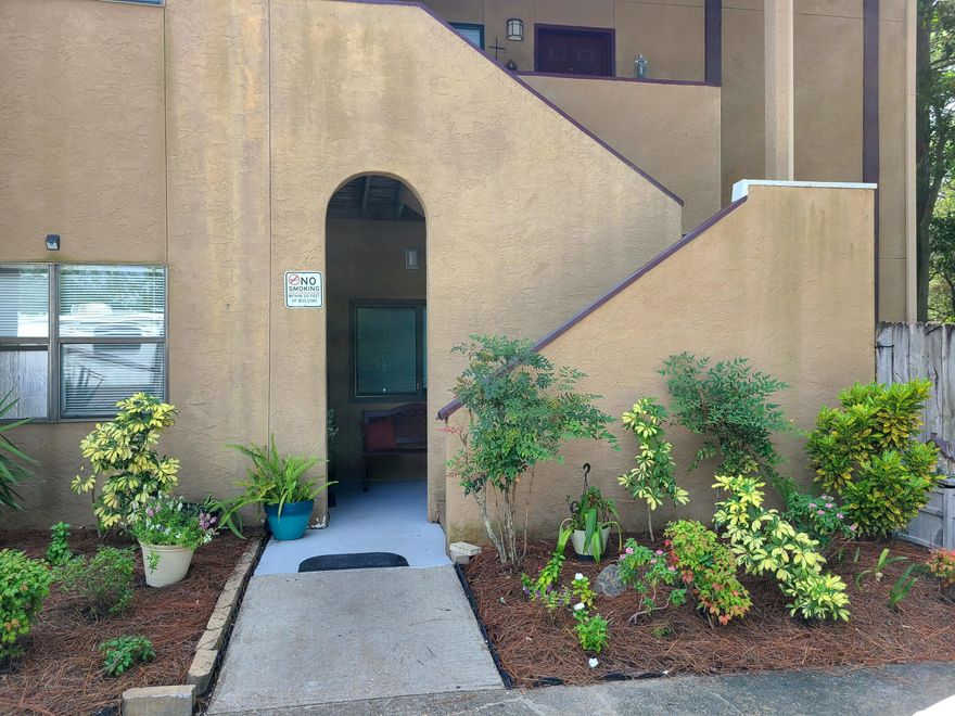 Perfect location in the heart of Destin! Directly across the street from the inter/coastal waterway. Open floor plan, 1bedroom 1bath has 9 foot ceilings with custom trim. Nicely appointed, with custom tile flooring & large sun room that doubles as a second bedroom. Condo complex has 8 units for a nice family atmosphere. Beautiful matures trees surround the community pool. Don't miss your opportunity to own this spacious condo that feels more like a custom home!