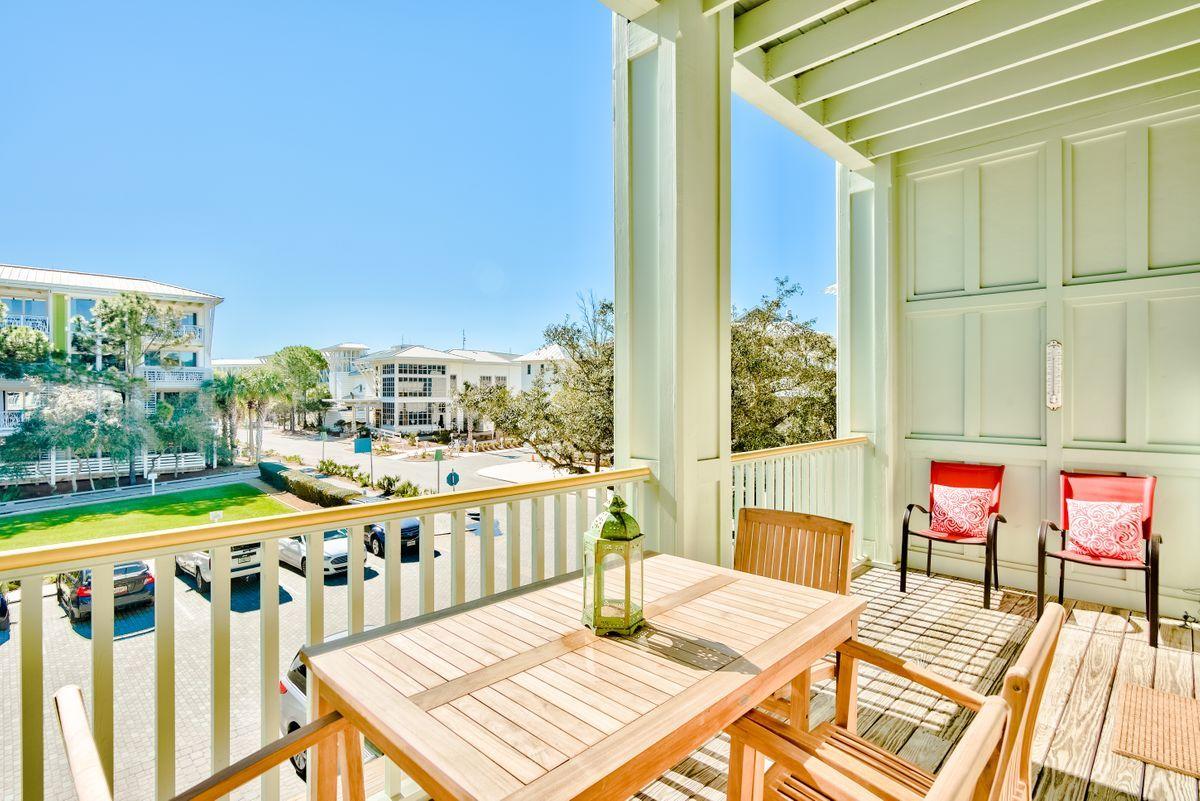 Well maintained, furnished, and offering an ideal Watercolor location next to the newly expanded Watercolor Beach Club, this condo provides a perfect vacation getaway. Occupying the second and third floors directly above the Watercolor Shop, the unit features exceptional 11 foot ceiling heights with crown molding and natural light streaming through the oversized French doors and transom windows. The chef's kitchen features stainless steel appliances and white cottage-style cabinetry that perfectly complements black granite countertops. Wood flooring on both floors and the stairs, tile in the 2-1/2 baths, shower doors, wood shelving, tv's, and lighting throughout are all new.