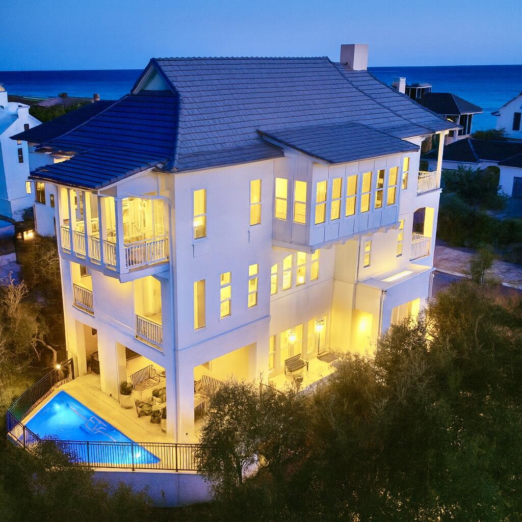 Rare opportunity in secluded Stallworth Preserve with the BEST views on 30A! A must see, masterfully designed home that takes advantage of the privacy and sweeping views of the beach, coastal dune lake and state park. The 5 bedroom, 5 full bath and two half bath home is just under 4,000 sq. ft. The first floor features the entry, laundry, two-car garage and incredible outdoor living area, summer kitchen and private pool overlooking the coastal dune lake. The second floor features four bedrooms with ensuites. The impressive third floor hosts the living, dining and kitchen with magnificent views, in addition to the spacious master bedroom. Stallworth is a gated, non-rental community. Beach access is located directly across from the driveway.