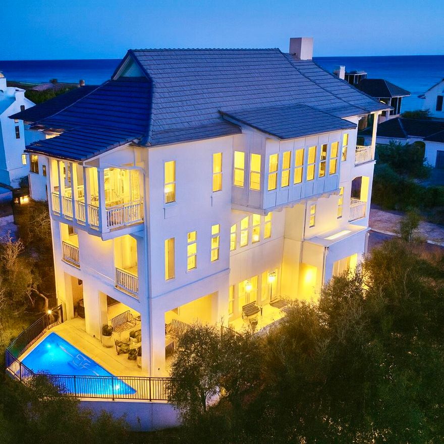 Rare opportunity in secluded Stallworth Preserve with the BEST views on 30A! A must see, masterfully designed home that takes advantage of the privacy and sweeping views of the beach, coastal dune lake and state park. The 5 bedroom, 5 full bath and two half bath home is just under 4,000 sq. ft. The first floor features the entry, laundry, two-car garage and incredible outdoor living area, summer kitchen and private pool overlooking the coastal dune lake. The second floor features four bedrooms with ensuites. The impressive third floor hosts the living, dining and kitchen with magnificent views, in addition to the spacious master bedroom. Stallworth is a gated, non-rental community. Beach access is located directly across from the driveway.