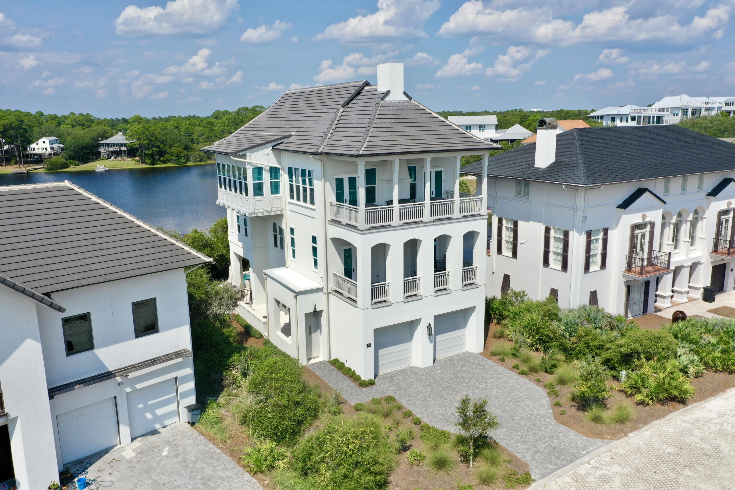 Rare opportunity in secluded Stallworth Preserve with the BEST views on 30A! A must see, masterfully designed home that takes advantage of the privacy and sweeping views of the beach, coastal dune lake and state park. The 5 bedroom, 5 full bath and two half bath home is just under 4,000 sq. ft. The first floor features the entry, laundry, two-car garage and incredible outdoor living area, summer kitchen and private pool overlooking the coastal dune lake. The second floor features four bedrooms with ensuites. The impressive third floor hosts the living, dining and kitchen with magnificent views, in addition to the spacious master bedroom. Stallworth is a gated, non-rental community. Beach access is located directly across from the driveway.