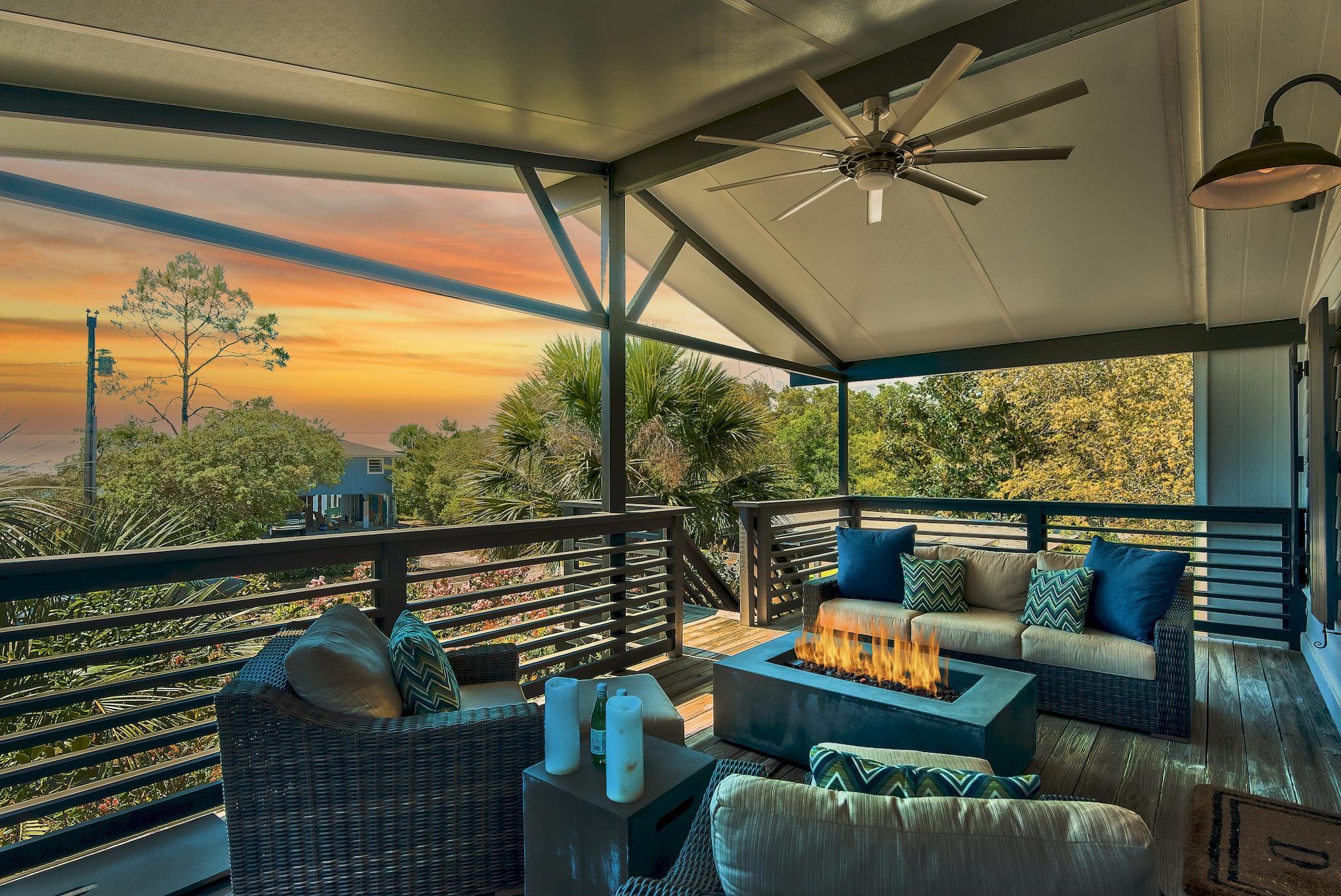 Tucked away behind lush and well manicured landscaping resides ''The Douglas Retreat''. This charming beach cottage is the ultimate oasis offering an especial ambiance gleaned from the surrounding nature and private setting. A truly rare opportunity featuring updated finishes and fixtures, turn-key condition, and the perfect location just steps away from the white sugar sand beaches. The floor plan was designed with entertaining in mind boasting four bedrooms, two and a half bathrooms, multiple outdoor living areas, and an oversized private pool. The main living area is flooded with natural light and custom coastal chic furnishings. Stainless steel appliances, an island with integrated seating for four, and an open dining room complete the kitchen.