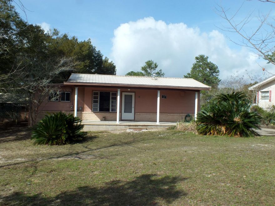 Older ranch with 70 ft of frontage on Lake Stanley. The 2 BR/2BA house needs a little TLC, but has tremendous potential to be made into a comfortable lakefront home or an excellent rental property. The large back yard slopes toward the lake and includes a detached 2-car garage. The house is located within an mile of historic, vibrant downtown DeFuniak Springs, recently voted the Best small town in Florida by MainStreet USA and is less than 1 hour to the dining, shopping and beachesof South Walton.