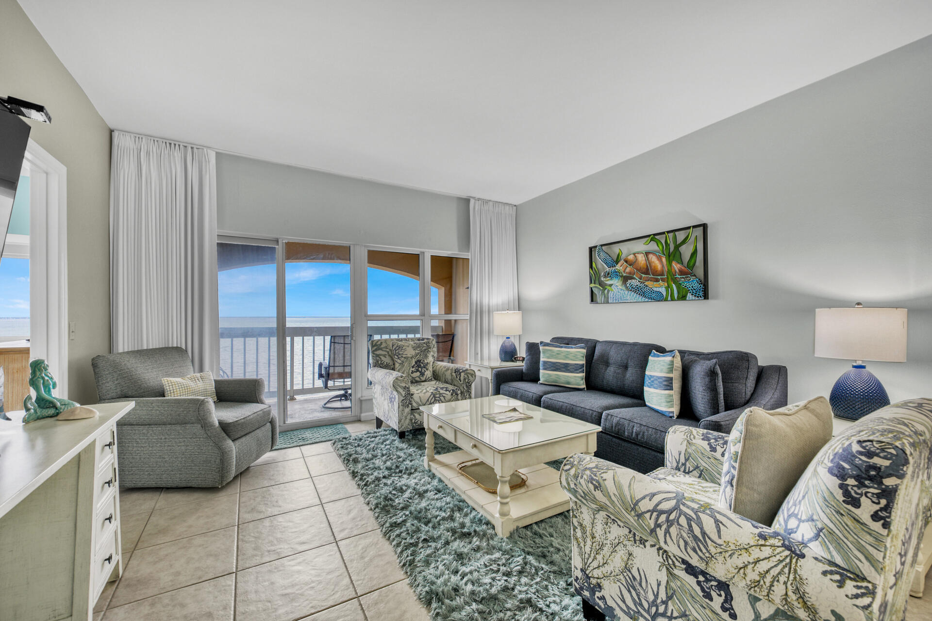 Enjoy panoramic waterfront views from the TOP FLOOR of Players Club on the Bay Condo located on the quiet side of Sandestin Golf and Beach Resort. Surrounded by the Linkside Golf Course, Players Club has a community pool and assigned parking for your golf cart. With Vacation Rental Projections from 45k to over $58K with a golf cart, this 2 Bedroom, 2 Bath condo has ALL TILE FLOORS, stainless steel appliances and was recently updated with fun beachy colors and could also be a great primary or 2nd home. Sandestin offers private beach access, community pools, 4 golf courses, tennis, pickleball, a marina and plenty of walking and biking paths. Enjoy fireworks from your balcony and several restaurants within the resort as well as in Grand Boulevard and Market Shops on beach side of the resort