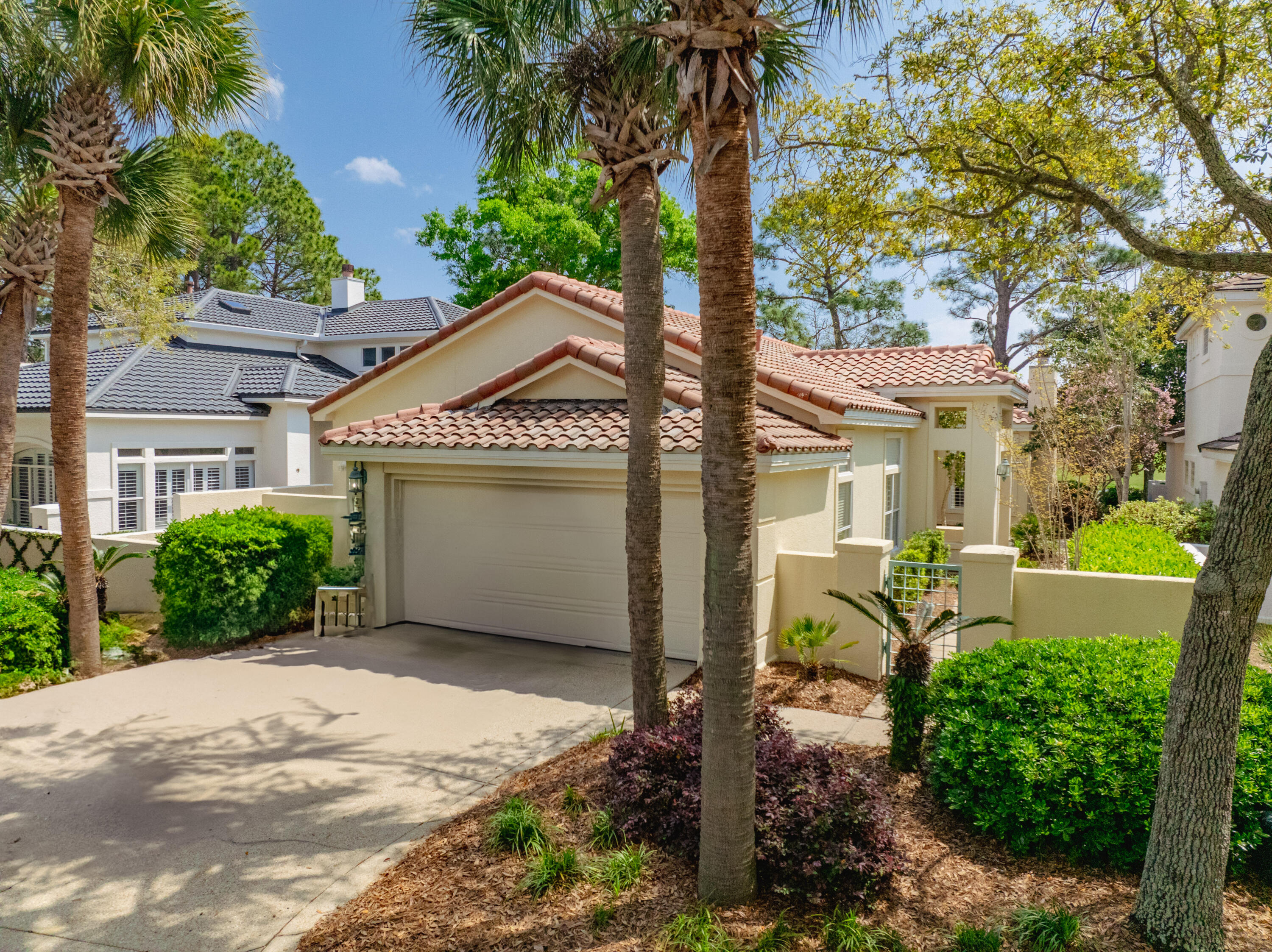 Nestled in a prime location with breathtaking lake and golf course views, this single-story home offers incredible potential. With 2 bedrooms, 2 bathrooms, and a versatile flex room that can easily be converted into a third bedroom, this home adapts to your needs. Both bedrooms offer private patios with sliding doors. A gated entrance welcomes you into a sunlit courtyard, setting the stage for the home's warm and inviting atmosphere. Inside, the expansive living spaces include a generous sitting area with wall-to-wall sliders opening to the courtyard, as well as a second living room featuring a cozy gas fireplace and seamless flow into the kitchen and back patio. Key updates include a professionally certified and well-maintained roof, a gas water heater (2015), HVAC system (2014), garage door (2017), and full exterior paint (2014). Situated in a community that restricts short-term rentals, it provides a peaceful retreat while still being conveniently located. With its unbeatable location, stunning views, and excellent structure, this home is ready for its next chapter!
Owners enjoy access to the two heated SOA pools: One across from Linkside Village on Audubon Drive and the Phil Hummel Aquatic Center centrally located at the Baytowne Ave Traffic Circle.
As an introduction to the Sandestin lifestyle, we invite our new owners to explore amenities that make Sandestin special. The listing brokerage and seller(s) are presenting the buyer(s) of this property with (2) 90-minute rounds of Tennis court time, a golf foursome at one of our three championship courses, and a round of golf for up to four (4) players at the unrivaled Burnt Pine Golf Club.
Golf and Beach Resort features more than seven miles of beaches and pristine bay front, four championship golf courses, 15 world-class tennis courts, a 226-slip marina, a fitness center, spa and celebrity chef dining. Shop, dine and play at the charming pedestrian village, The Village of Baytowne Wharf and more. Inside the gates of the resort, residents enjoy a balanced lifestyle of high-class living, spanning the 2,400 acres from the beach to the bay. Everything within the gates of the resort is accessible by golf cart or bicycle. The entire resort is interconnected by miles of pedestrian, bike and golf cart paths that weave through groves of live oaks, meandering past natural lagoons, fountains, man-made lakes, and meticulously landscaped fairways.